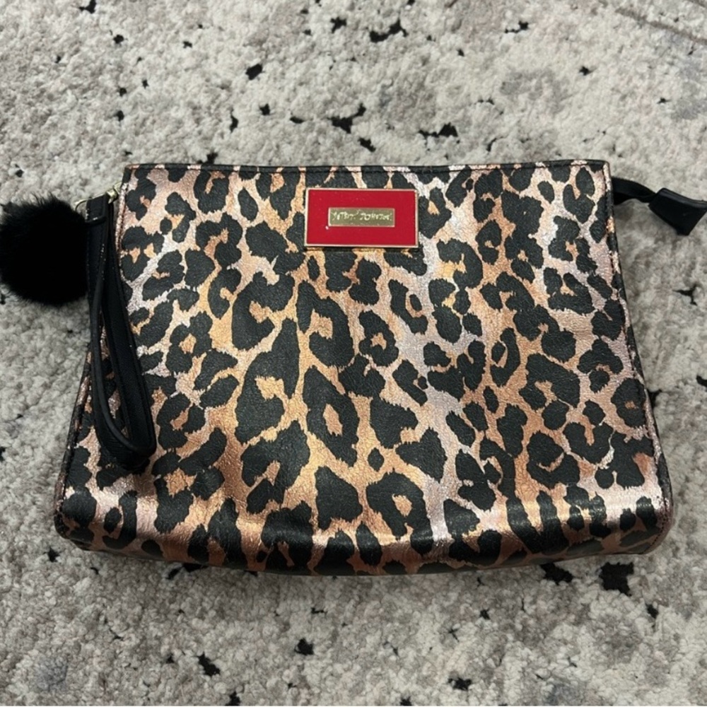 EUC Betsey Johnson Animal Print Floral interior Zippered Pom Pull Wristlet